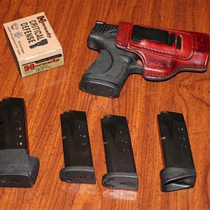 various mags I have for the m&p: a 15 round rd mag, three 10 rd mags, two with flat bases to "print" less, and one with the pinky extension