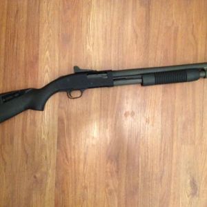 Mossberg 590A1 18.5" speed feed stock, ghost ring sites.