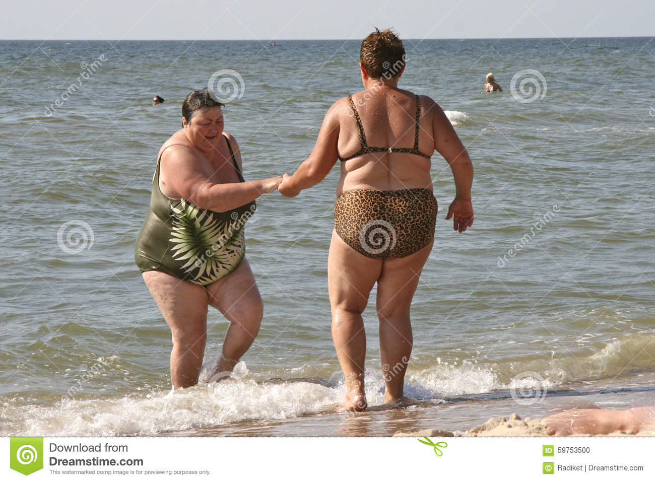 fat-people-sea-urzuf-ukraine-july-woman-helps-her-friend-out-water-picture-was-taken-shore-azo...jpg