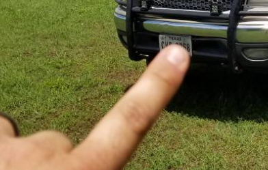 finger of license plate.PNG