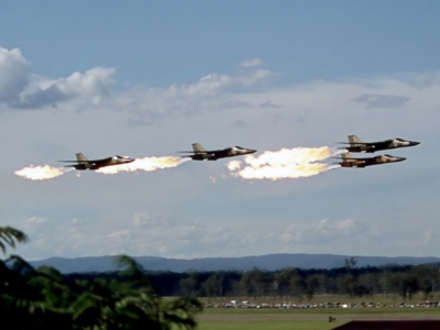 4_RAAF_F-111C_perform_a_low-pass_dump_and_burn_%281%29.jpg