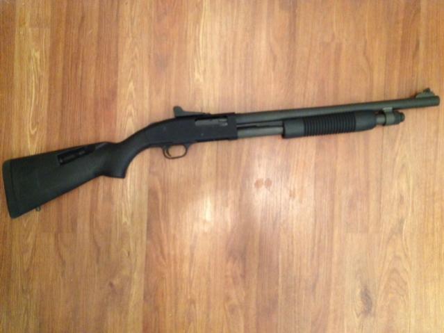 Mossberg 590A1 18.5" speed feed stock, ghost ring sites.